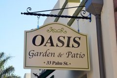 blade-sign-painted-wood-sign-oasis-garden-patio.jpg