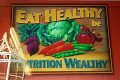 Westridge Mid-town Market Grocery Store Be Healthy Produce Sign for inside the store.