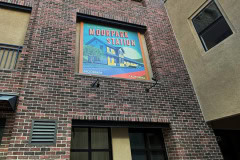 Moorpark Station custom graphic sign on a brick building in Moorpark, California