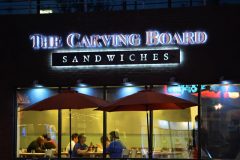 custom-sign-illuminated-channel-letter-woodland-hills-carving-board-night.jpg