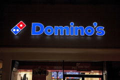This is a photo of the Dominos illuminated channel letter sign fabricated and installed by national sign company, Dave’s Signs. This Domino