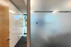 Frosted glass office sign "Goleta Beach" room for Resonanat in Goleta by Dave's Signs.