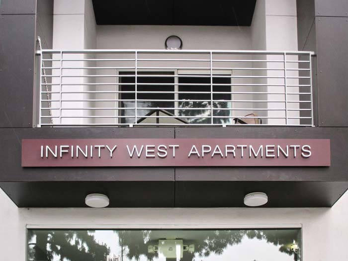 Infinity West Apartment Sign