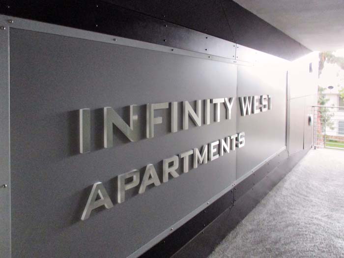 Infinity West Apartments Sign