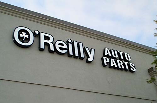 Santa Barbara O'Reilly's Auto Parts front-lit illuminated sign