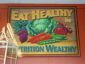 Westridge Market indoor mounted metal produce signs in Ojai, CA.