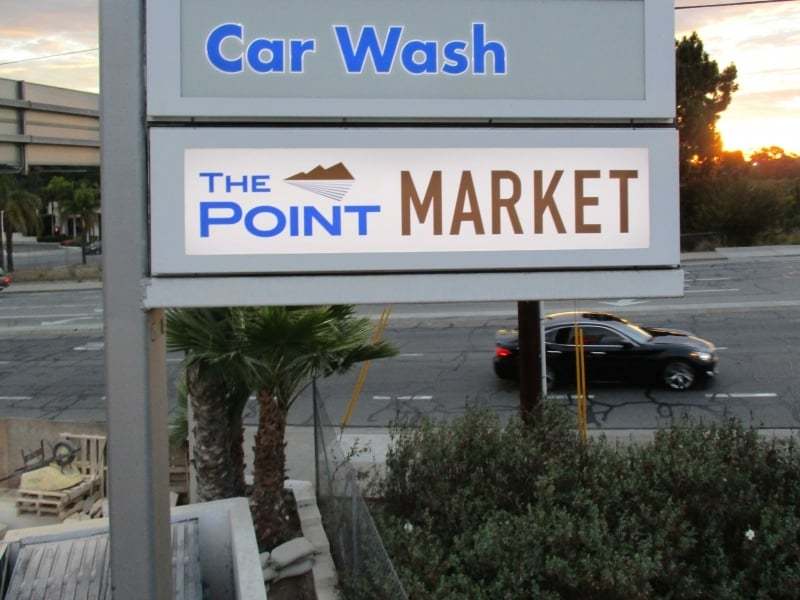 illuminated lightbox sign the point market