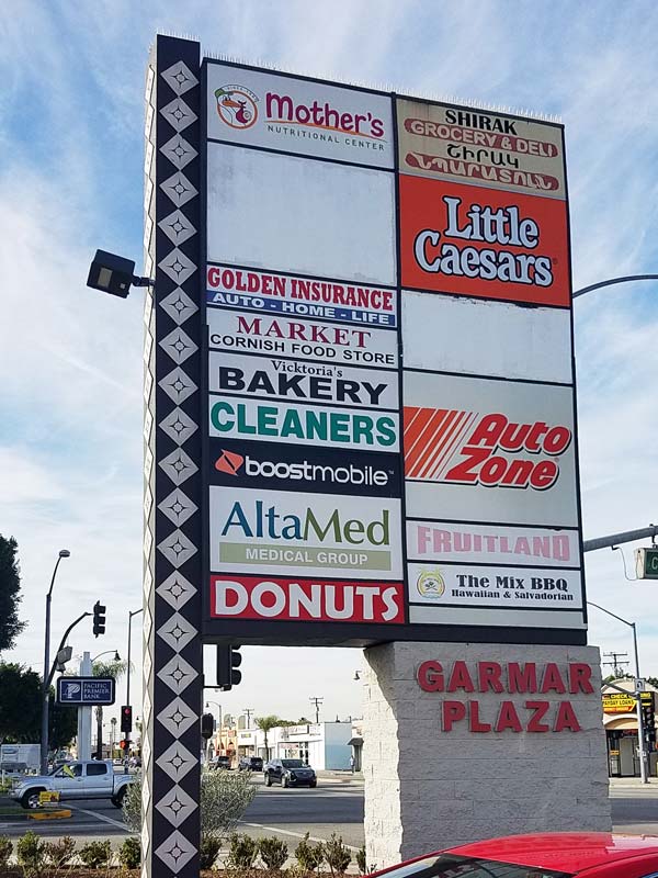 Plaza Tenant Sign Restoration