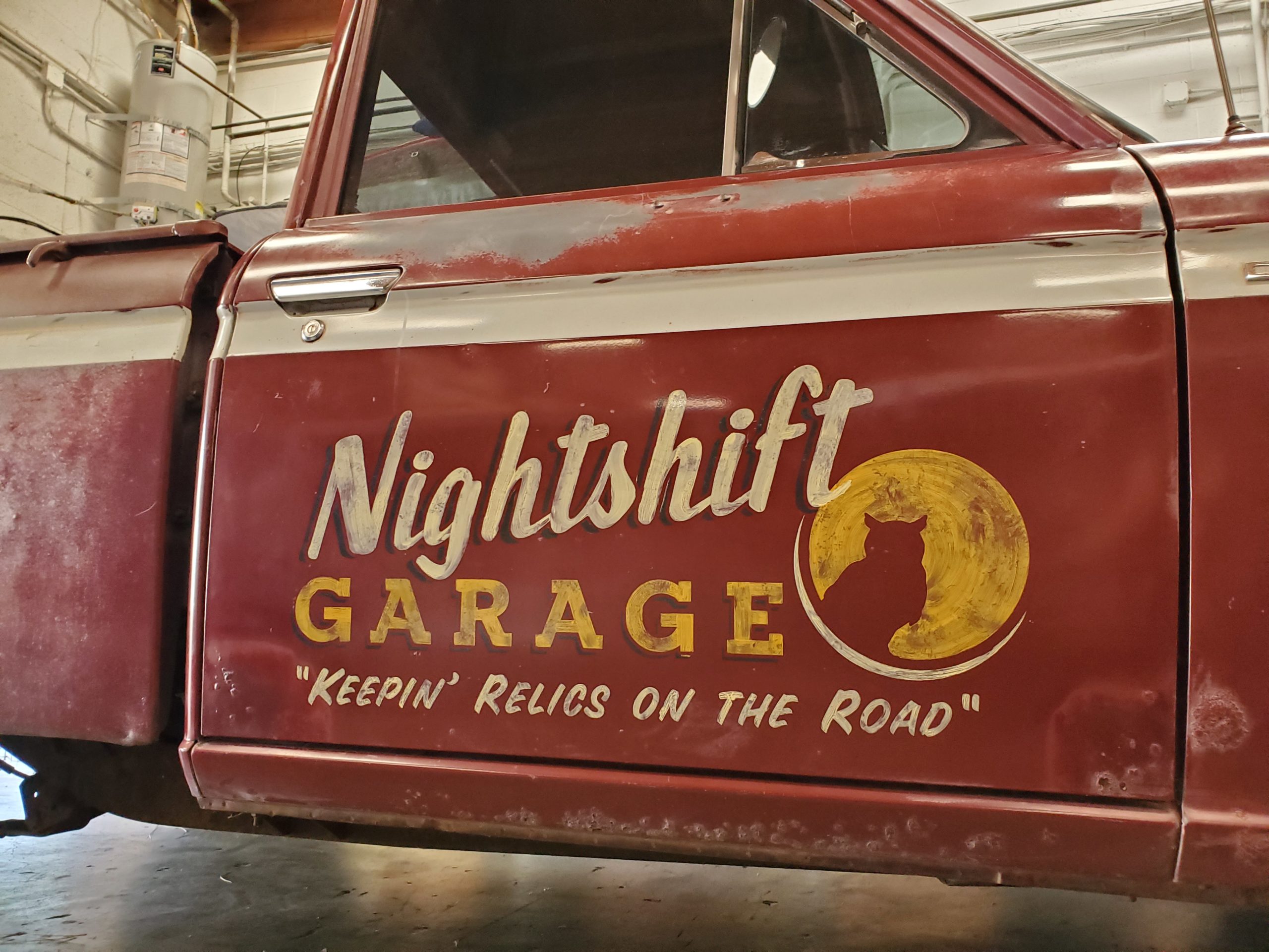 Vintage custom sign design on Datsun Truck 
