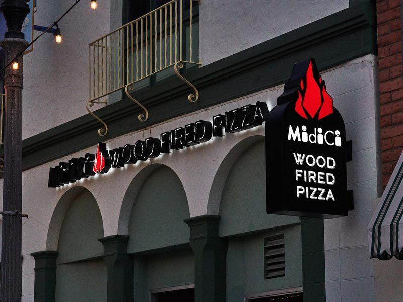 Midici Wood Fired Pizza cabinet blade sign - a custom lightbox - and halo-lit channel letters in Ventura, CA.