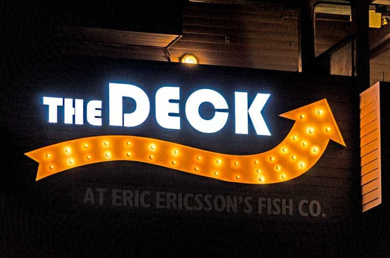 Exterior signs like this one need to withstand the elements. The Deck located at the Ventura Pier sits right next to the water.