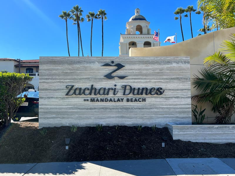 This is a custom illuminated monument sign for Zachari Dunes Resort Suites on Mandalay Beach in Oxnard, CA.