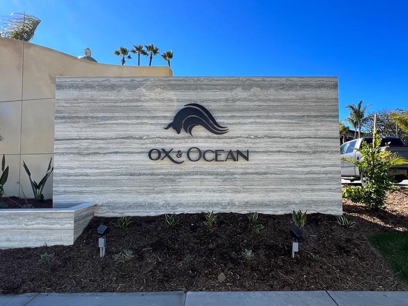 Custom signs make a statement like this hotel restaurant channel letter monument sign for Ox and Ocean in Oxnard, CA.