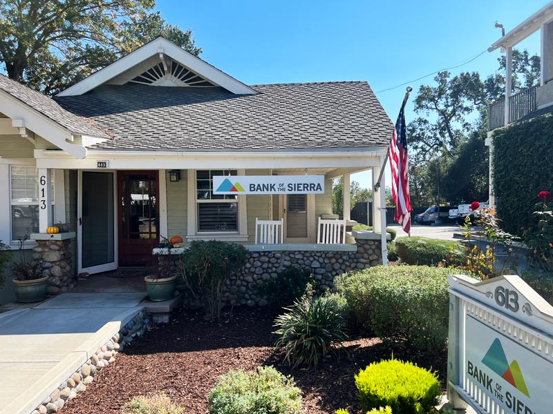 Custom business signs allow you to match the property like this small town feel for a branch in Templeton, CA.