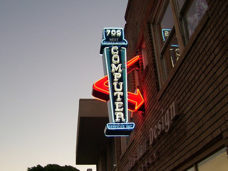 Lit letters like this neon sign from Next Generation Computer Services Inc give off a nostalgic feel.