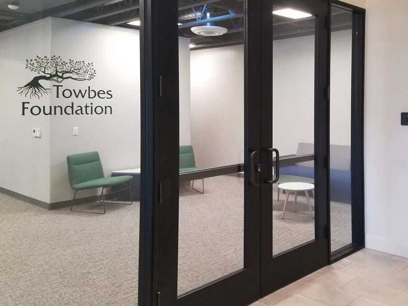 Indoor signs like this window graphic sign for Towbes Foundation in Santa Barbara, CA is the perfect solution. 