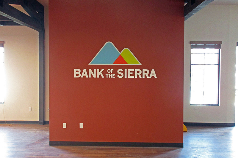 Interior signs like this Bank of the Sierra acrylic logo sign are in all locations across California.