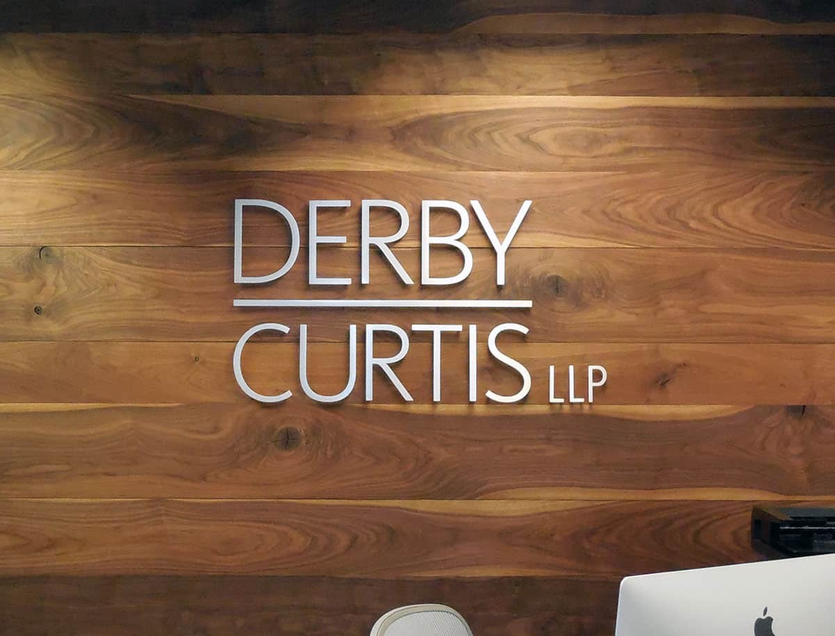 Office signs like this dimensional letter sign for Derby Curtis LLP in Los Angeles in are simple but look so appealing.