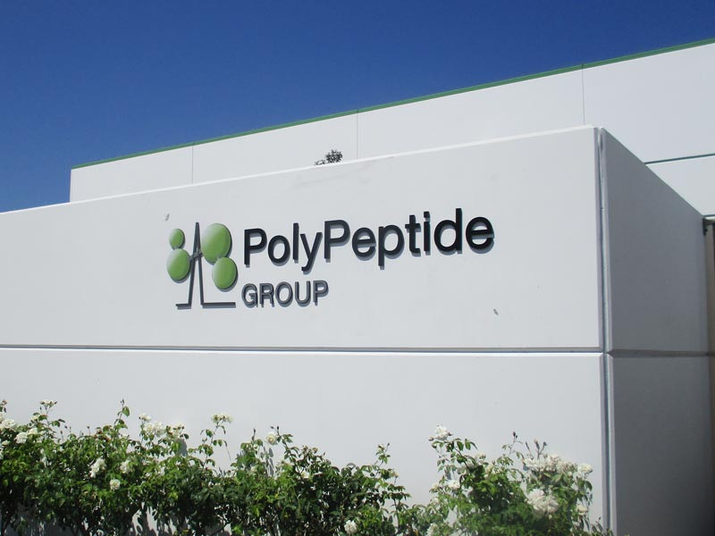 Exterior signs like this dimensional letter outdoor sign for PolyPeptide Group in Torrance, CA is part of a sign system we did. 