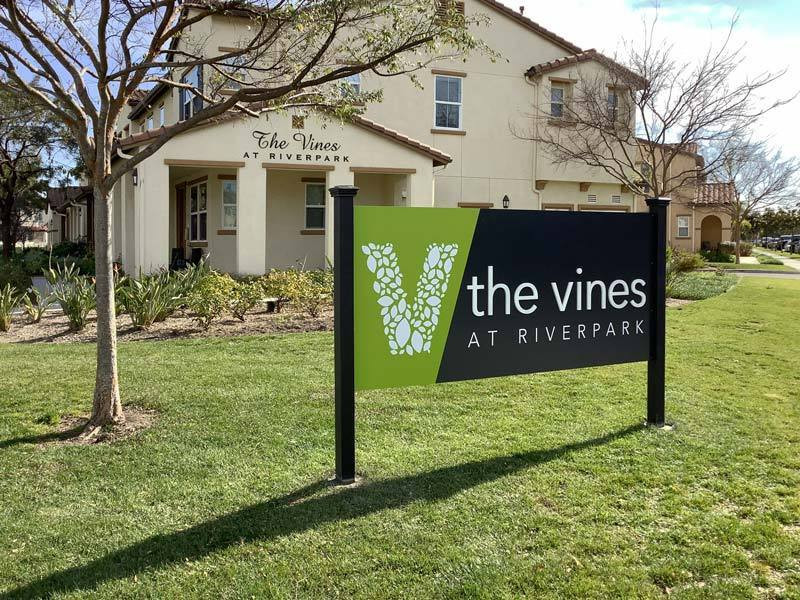 This post and panel sign plus dimensional letters on the building behind are part of a sign system we did for a new community in Oxnard, CA – The Vines at Riverpark. 