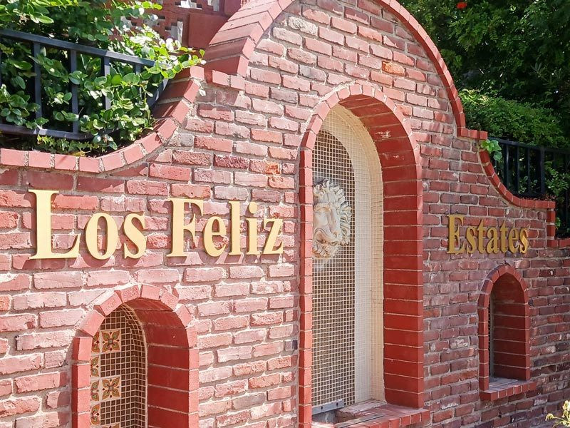 Outdoor signs like this architectural sign for Los Feliz Estates in Los Angeles, CA set the tone for the community