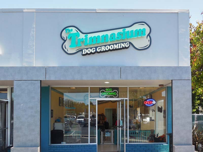 Trimnasium Dog Grooming sign in Goleta at the Calle Real Center. 