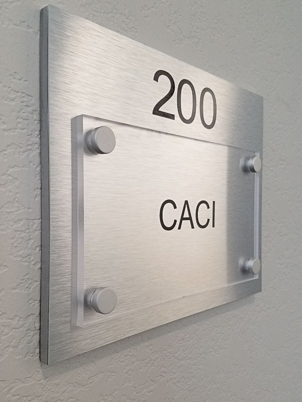 Office suite signs add to the elegance of the space. Clear acrylic or plexiglass are a popular choice.