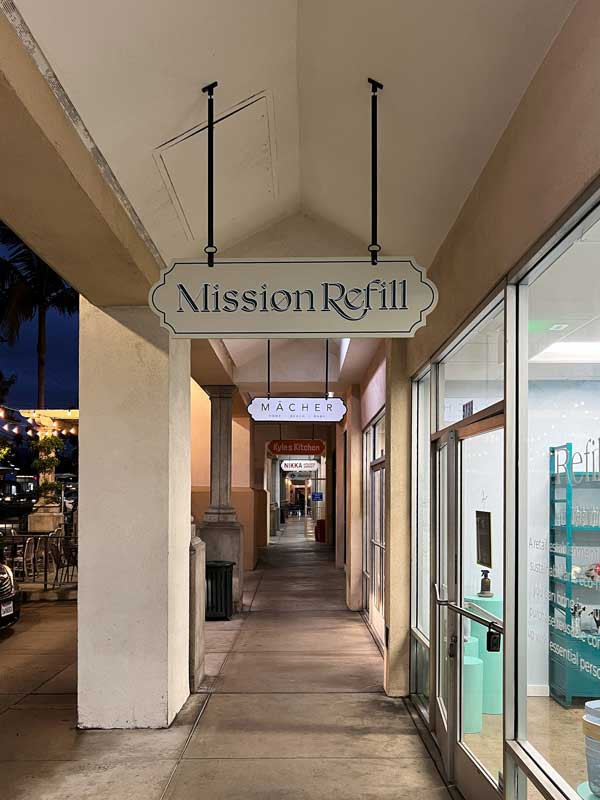 Goleta signs – The Mission Refill blade sign is also consistent with the style of the Shopping Center.