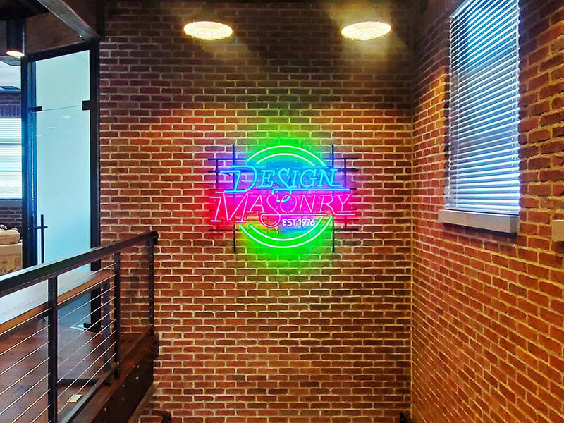 Office signs like this indoor neon sign add a little fun and make the business stand out even more.