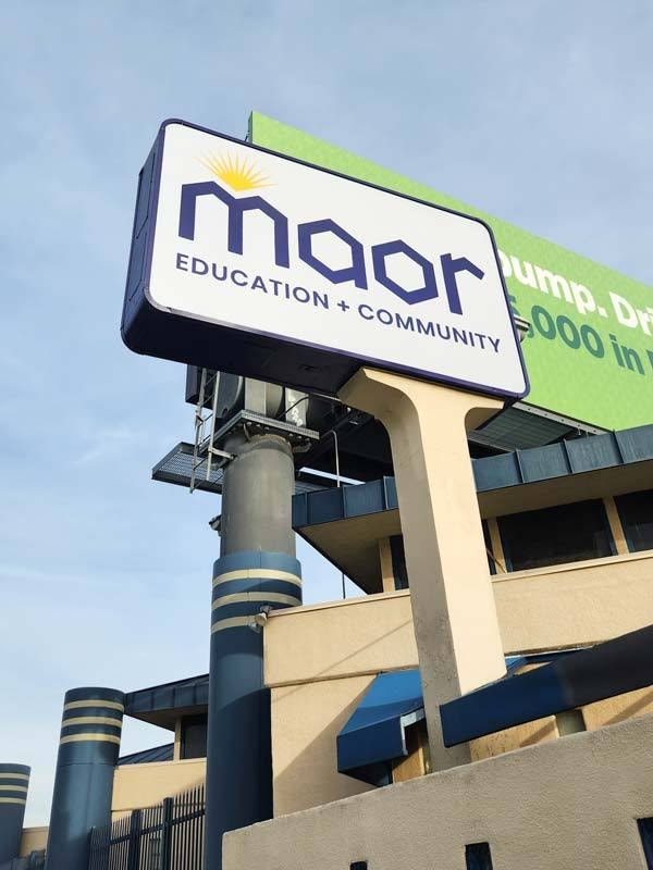 Sign Company Near Me in Los Angeles. Maor Education + Community pole mounted lightbox sign in Los Angeles, CA.