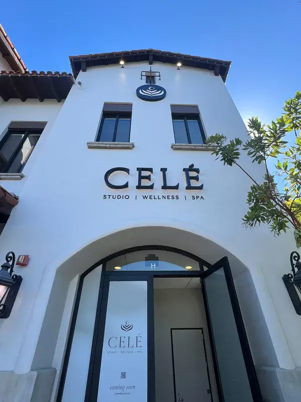 Celé Wellness illuminated channel letters and lightbox storefront sign.