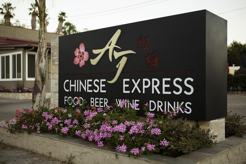 Chinese Express monument sign in Ojai, CA featuring an aluminum cabinet with illuminated lightbox construction and dimensional lettering.