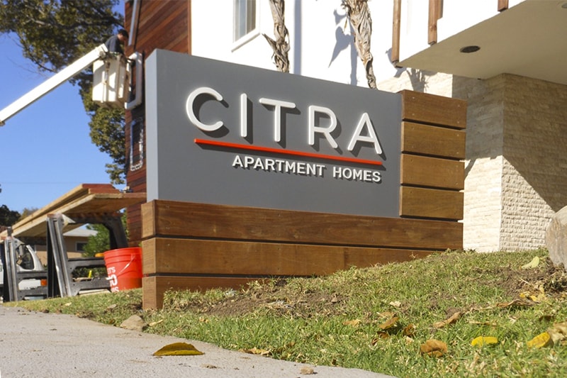 Architectural monument sign for CITRA Apartment Homes in Burbank, CA designed to complement the property’s contemporary exterior.