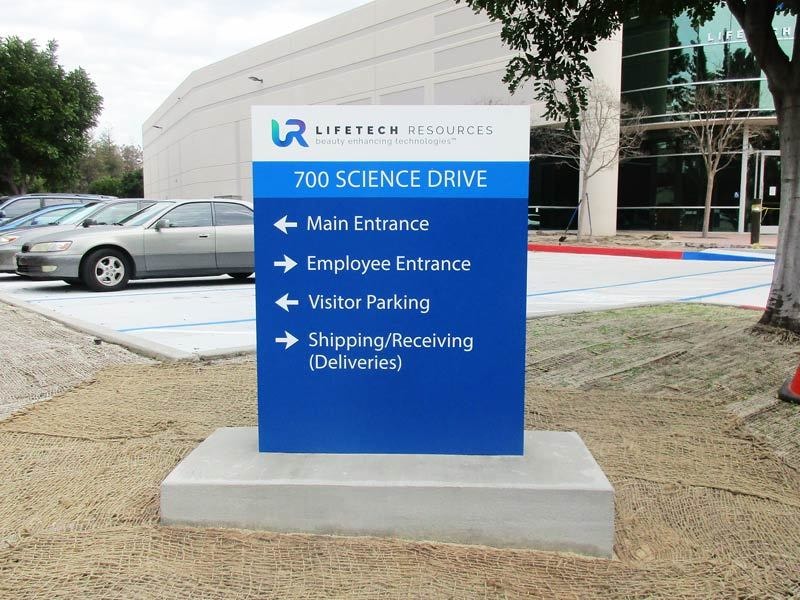 Lifetech Resources corporate monument directory sign in Moorpark, CA featuring integrated wayfinding and directional panels for business park navigation.
