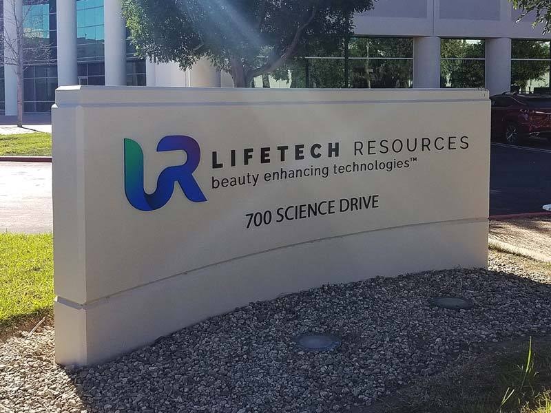 Lifetech Resources monument sign in Moorpark, CA featuring a stucco architectural base with dimensional lettering as part of a coordinated corporate sign program.