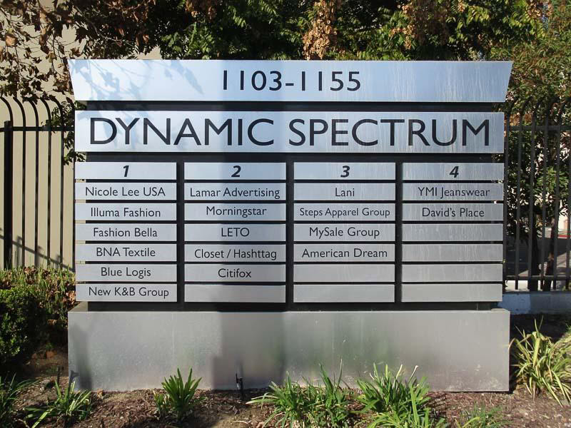 Multi-tenant business sign system for Dynamic Spectrum in Los Angeles—designed to clearly identify tenants and create a cohesive look across the property.