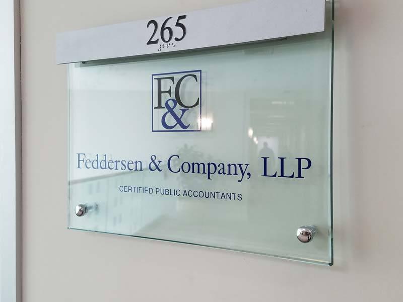 Custom ADA compliant office sign for Feddersen & Company in Agoura, CA—combining clean design with required braille, tactile lettering, and code-compliant installation.