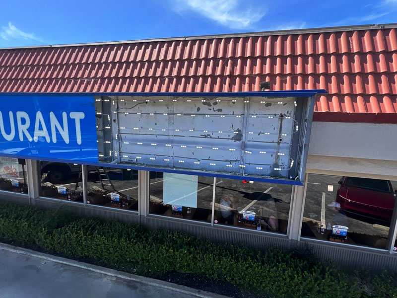 LED modules installed inside an IHOP sign cabinet during a fluorescent-to-LED retrofit project in Camarillo.