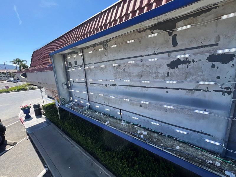 LED modules installed inside an IHOP sign cabinet during a fluorescent-to-LED retrofit project in Camarillo.