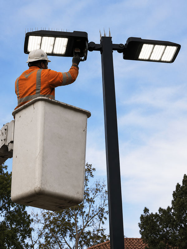 Parking lot lighting repair and LED fixture installation by Dave's Signs in Southern California
