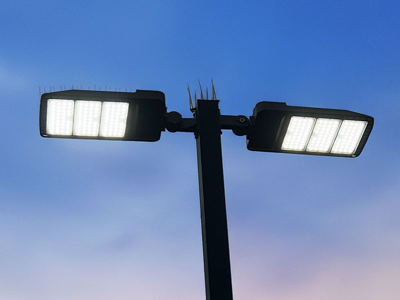 Modern LED parking lot light fixtures installed by Dave's Signs