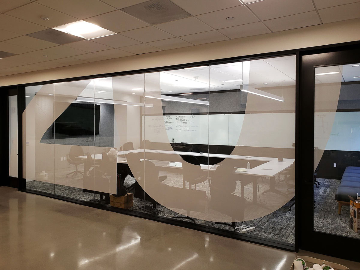 Frosted office window graphics used throughout the 20 Bloc Biopharma workspace.