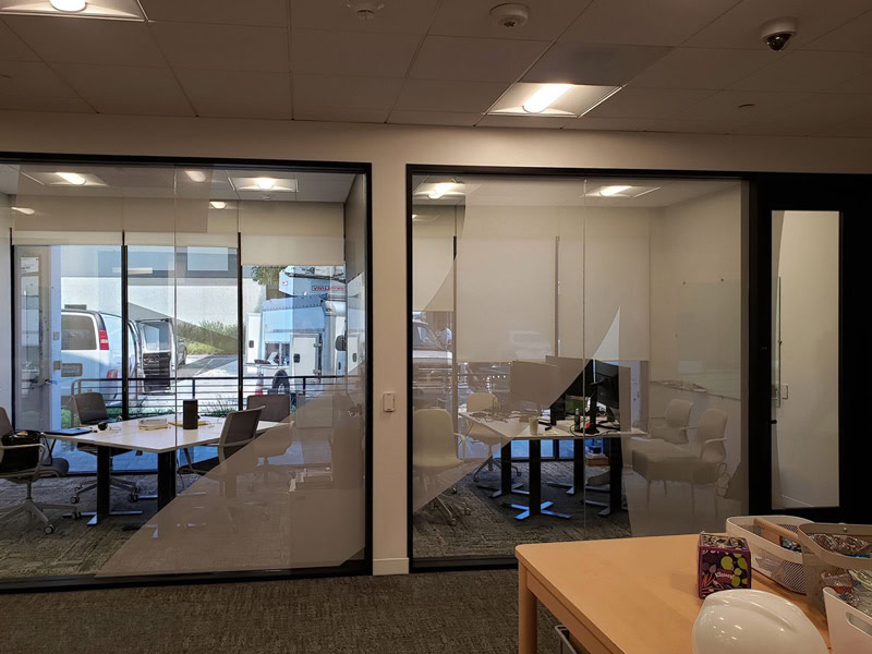 Frosted privacy window graphics throughout the 20 Bloc Biopharma office.